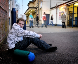 This was one of the 2 photos created by the clients to show what life was like being homeless. It was important that the teen was hiding from everyone because they felt homelessness embarrassing. They wanted the people in the background to be blurred as if getting on with their own lives.